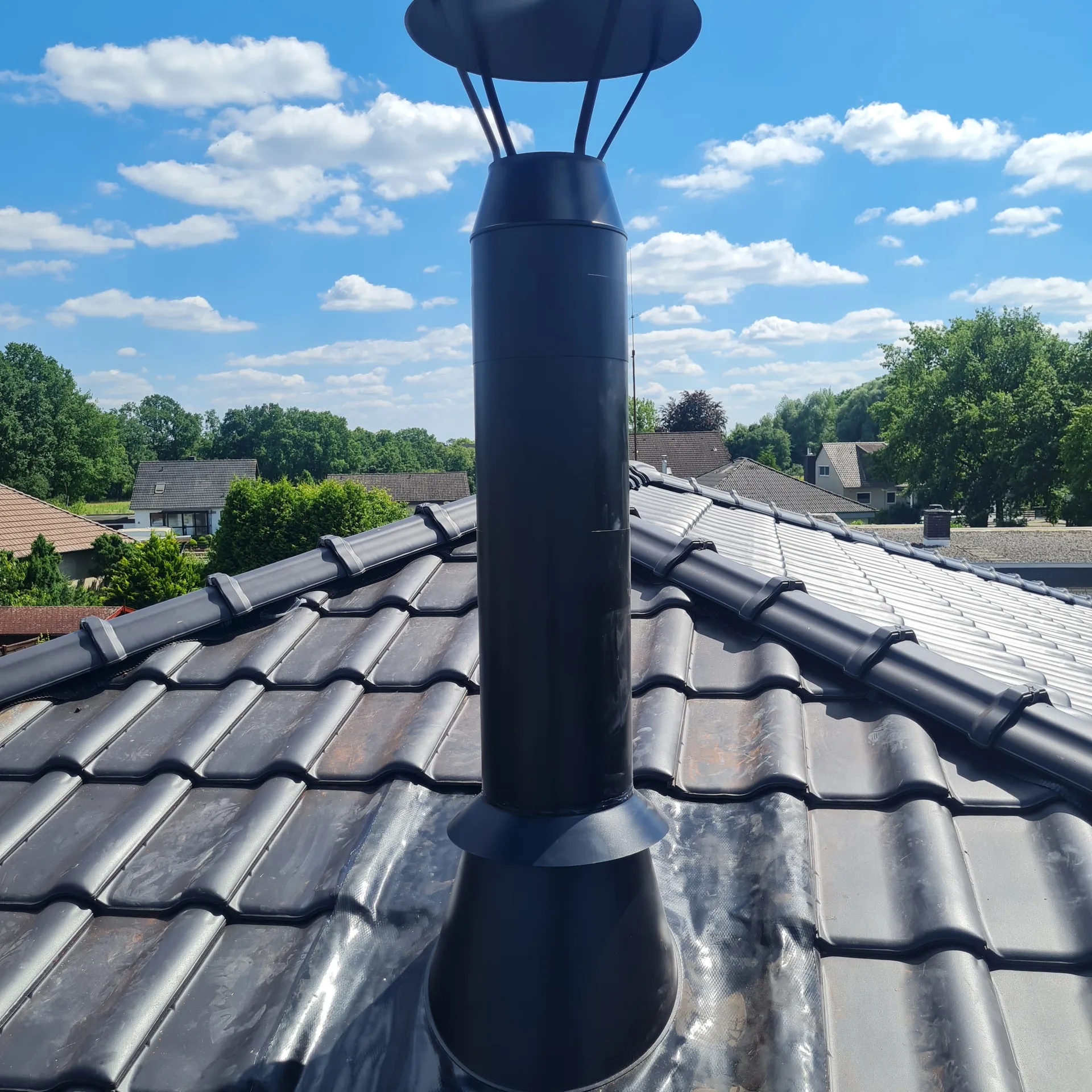 Black-coated chimney cowl