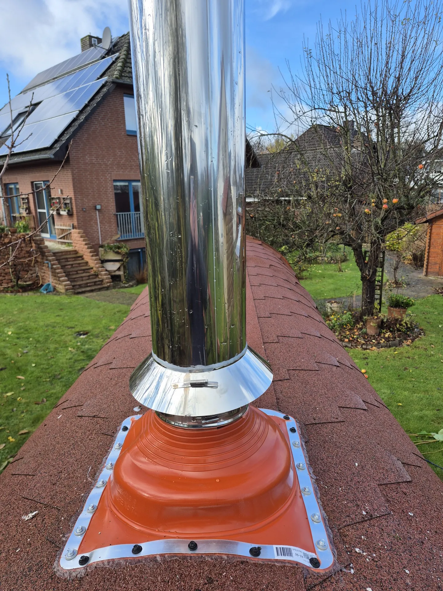 Roof penetration with flashing
