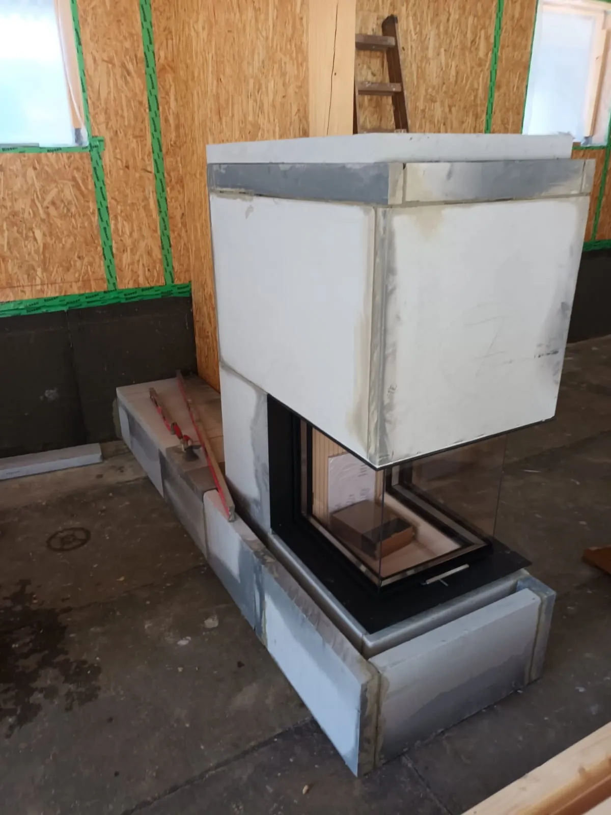 Three-sided fireplace under construction